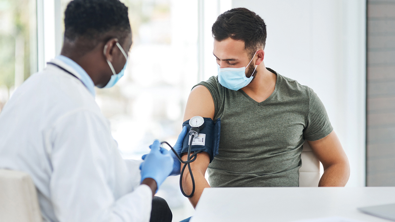 man getting blood pressure checked.jpg