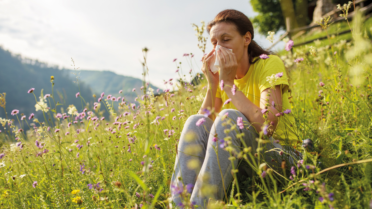 woman blowing her nose.jpg