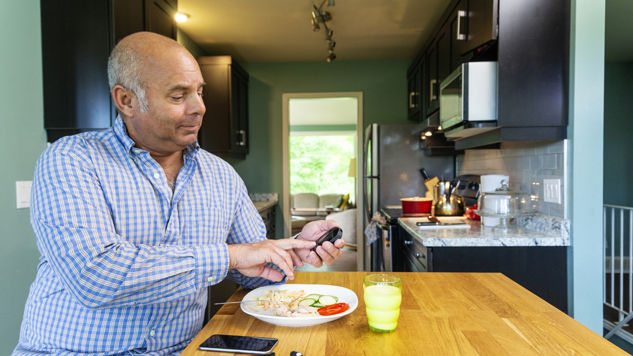 man-at-dining-table