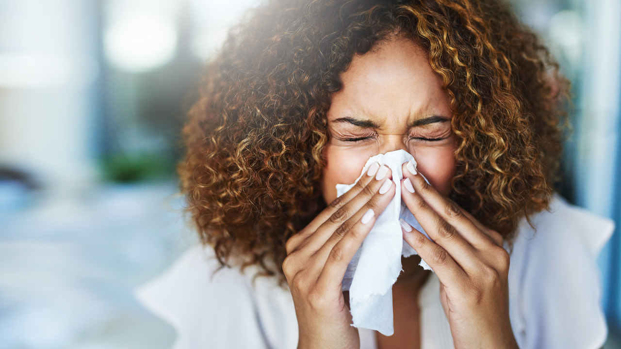 woman sneezing.jpg