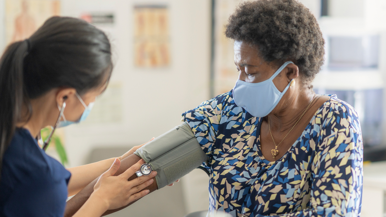 woman taking blood pressure.jpg